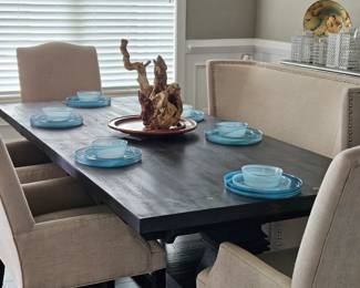 *Solid Heavy wooden dining table 
*Cream dining settee 
*4 Cream dining chairs
*6 Decorative place settings
*Unique wooden decorative 
  centerpiece 