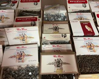 cigar boxes with nails and other hardware