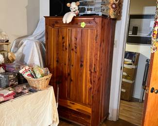 Armoire, speakers, birdcage, lamb chop, kitchen towels, silk pillowcases, clock radios lamp, ballet shoes, placemats, vintage handkerchiefs