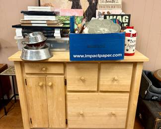 Light oak kitchen island cabinet + just a fraction of the selection of pet essentials