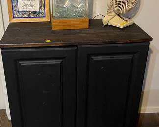Cabinet. Matches console in living room (pic coming soon)
