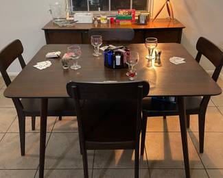 Cool retro vibes. Table 4 chairs, buffet is actually a dresser and the mirror to it is in our “media room” off the master.