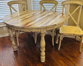 Camouflaged breakfast table. Works great. There are actually 4 chairs in the picture.