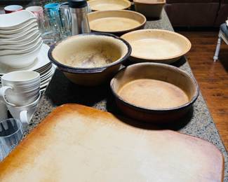 These look like the real thing. Serious Italian cookware. Here the dough pounding on the flatboard.