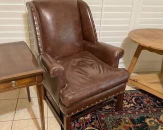 Fine leather chair with nail heads and stretcher