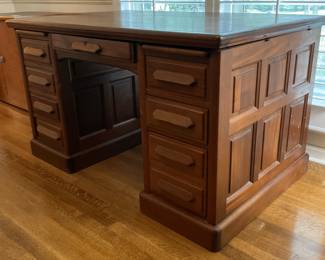 Antique paneled knee hole desk