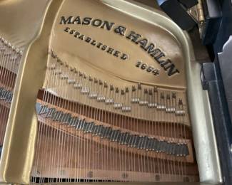Mason & Hamlin 9 foot concert grand piano. Hand rubbed black satin with an adjustable artist bench. All parts original. Good condition. Built in 1969.