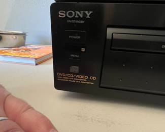 This lot includes a 1999 Technics SA-EX140 Stereo Receiver, a Sonance Speaker Distribution System Model 4MP, and a Sony DVP-S3000 DVD/CD Player. All items are in good working condition and ideal for enhancing your audio and video experience.
