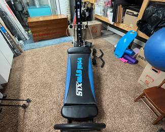 Total Gym XLS New Condition includes Wing Attachment and Leg Pull. Total Gym XLS home gym, multi-functional exercise equipment, includes additional accessories. Excellent condition with no signs of wear. Item is 91" overall.
The item is heavy and located in the basement. Winner must bring adequate help and a vehicle appropriate to transport. Item can be disassembled and instructions are available with the machine, winner must be able to disassemble.