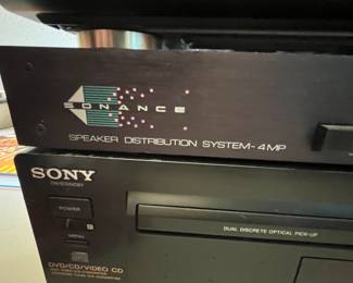 This lot includes a 1999 Technics SA-EX140 Stereo Receiver, a Sonance Speaker Distribution System Model 4MP, and a Sony DVP-S3000 DVD/CD Player. All items are in good working condition and ideal for enhancing your audio and video experience.