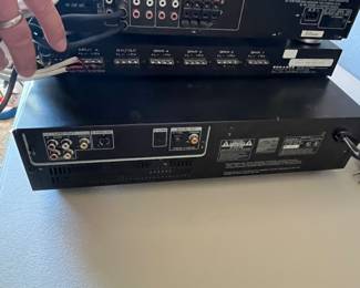 This lot includes a 1999 Technics SA-EX140 Stereo Receiver, a Sonance Speaker Distribution System Model 4MP, and a Sony DVP-S3000 DVD/CD Player. All items are in good working condition and ideal for enhancing your audio and video experience.