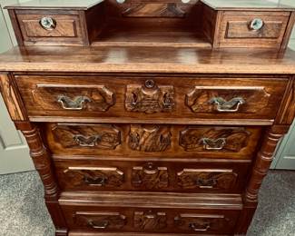 Antique Eastlake Dresser - Authentic Period Piece. This is a beautiful dresser in very good condition for an item of this age and use. Four large drawers and two small drawers on the dresser top. Mahogany with some burl veneers. Knapp drawer joints. Original brass drawer pulls on the large drawers. The drawers glide well. The dresser measures 49" tall over all, 41 1/2" tall in the front, 39 1/2" wide and 19 1/2" deep.
Note photos for details and condition. Measurements taken under field conditions are approximate within 1/2". Feel free to reach out with any questions.
Items are heavy and we do not assist with loading. Be sure to bring adequate help and a large enough vehicle for large items. If you need assistance, call Denny for an estimate for delivery. (720) 393-0204.