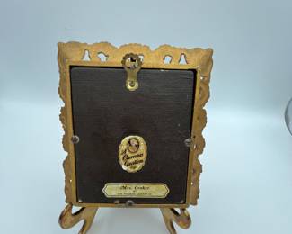 Antique Miniature Portrait. Vintage ornate picture frame featuring a hand painted portrait of a woman on porcelain. The frame is intricately designed with floral patterns and a gold finish, measuring approximately 6x8 inches.
Note photos for details and condition. Measurements taken under field conditions are approximate within 1/2". Feel free to reach out with any questions.