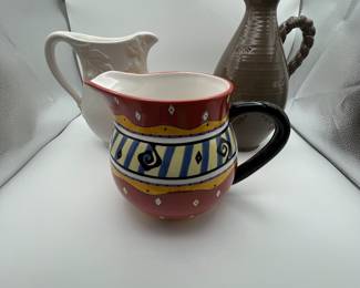 Decorative Pitcher Collection Vintage Pitcher Lot
This lot features three distinct pitchers: a vibrant ceramic pitcher with a colorful design, a classic white pitcher with leaf accents, and a rustic brown pottery pitcher with a braided handle. The first pitcher, likely a mid-20th century piece, showcases intricate patterns and a shiny finish. The white pitcher exudes elegance, perfect for display or use, while the brown pitcher offers a charming vintage look. Ideal for collectors or as decorative home accents.
Note photos for details and condition. Measurements taken under field conditions are approximate within 1/2". Feel free to reach out with any questions.
Items are heavy and we do not assist with loading. Be sure to bring adequate help and a large enough vehicle for large items. If you need assistance, call Denny for an estimate for delivery. (720) 393-0204.