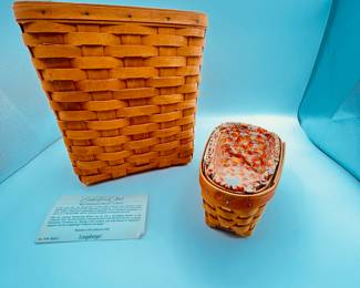 Longaberger Basket, Including Wall Hanging Basket
Includes a large basket that hangs on the wall and a candy corn small basket. Large basket is woven in a classic design, 2000s era. Small basket features a decorative fabric liner. Both items in great condition.
Note photos for details and condition. Measurements taken under field conditions are approximate within 1/2". Feel free to reach out with any questions.