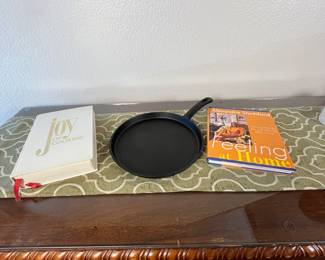 Cookware and Cookbooks Lot
Includes a 1967 edition of 'Joy of Cooking' by Irma S. Rombauer and a 1999 edition of 'Feeling at Home' by Alexandra Stoddard, along with a cast iron skillet.
Note photos for details and condition. Measurements taken under field conditions are approximate within 1/2". Feel free to reach out with any questions.
Items are heavy and we do not assist with loading. Be sure to bring adequate help and a large enough vehicle for large items. If you need assistance, call Denny for an estimate for delivery. (720) 393-0204.