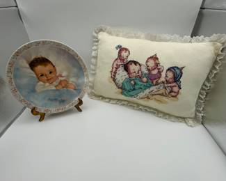 Vintage Cross Stitch! Beautiful Cross Stitch Pillow and Collectible Plate - Baby Shower Gifts!
This is a small collection of baby themed items. A beautiful hand cross stitched pillow featuring babies and a collectible plate. Wonderful nursery decor or memorable shower gifts. Very good condition and absolutely adorable.