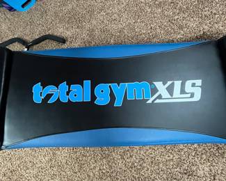 Total Gym XLS New Condition includes Wing Attachment and Leg Pull.Total Gym XLS home gym, multi-functional exercise equipment, includes additional accessories. Excellent condition with no signs of wear. Item is 91" overall.
The item is heavy and located in the basement. Winner must bring adequate help and a vehicle appropriate to transport. Item can be disassembled and instructions are available with the machine, winner must be able to disassemble.