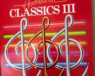 Includes 'A Treasury of Favorite Light Classics' featuring the Chicago Symphony Orchestra, and 'Hooked on Classics III' conducted by Louis Clark, featuring the Royal Philharmonic Orchestra. Both items are vinyl records.
Note photos for details and condition. Measurements taken under field conditions are approximate within 1/2". Feel free to reach out with any questions.