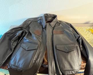 Mike's Leather Bomber Jacket. Brown leather jacket, XXL, featuring two front pockets and patches. Vintage style, ideal for casual wear or collectors. Military Patches have been removed. Velcro remains.
Note photos for details and condition. Measurements taken under field conditions are approximate within 1/2". Feel free to reach out with any questions.
Items are heavy and we do not assist with loading. Be sure to bring adequate help and a large enough vehicle for large items. If you need assistance, call Denny for an estimate for delivery. (720) 393-0204.