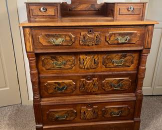 Antique Eastlake Dresser - Authentic Period Piece. This is a beautiful dresser in very good condition for an item of this age and use. Four large drawers and two small drawers on the dresser top. Mahogany with some burl veneers. Knapp drawer joints. Original brass drawer pulls on the large drawers. The drawers glide well. The dresser measures 49" tall over all, 41 1/2" tall in the front, 39 1/2" wide and 19 1/2" deep.
Note photos for details and condition. Measurements taken under field conditions are approximate within 1/2". Feel free to reach out with any questions.
Items are heavy and we do not assist with loading. Be sure to bring adequate help and a large enough vehicle for large items. If you need assistance, call Denny for an estimate for delivery. (720) 393-0204.
