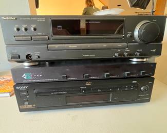 This lot includes a 1999 Technics SA-EX140 Stereo Receiver, a Sonance Speaker Distribution System Model 4MP, and a Sony DVP-S3000 DVD/CD Player. All items are in good working condition and ideal for enhancing your audio and video experience.
