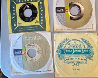 Vintage 45 RPM Record Collection - Charlie Daniel’s Band, The Sandpipers, Peter Paul and Mary, The Jackson 5. Featuring a selection of 15 records from various labels including RCA Victor, Atlantic, Imperial Records, and Atco Records, primarily from the 1960s and 1970s. Each record is housed in its original sleeve, showcasing classic designs and branding.
Note photos for details and condition. Measurements taken under field conditions are approximate within 1/2". Feel free to reach out with any questions.