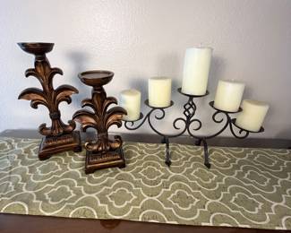 Vintage Candle Holders Set. Set includes two ornate wooden candle holders and a wrought iron candelabra with five white candles. The candle holders feature a stylish vintage design.
Note photos for details and condition. Measurements taken under field conditions are approximate within 1/2". Feel free to reach out with any questions.