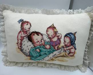 This is a small collection of baby themed items. A beautiful hand cross stitched pillow featuring babies and a collectible plate. Wonderful nursery decor or memorable shower gifts. Very good condition and absolutely adorable.