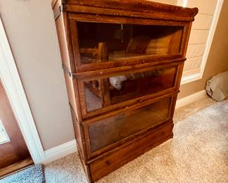 Antique Oak Barrister Cabinet Set from The Globe-Wernicke Co.. This is an antique barrister cabinet with three glass-fronted compartments, crafted from oak. Made by Globe Wernicke Co. - Likely from the early 20th century. Features a lower drawer for additional storage. Model number D 81 299.
Note photos for details and condition. Measurements taken under field conditions are approximate within 1/2". Feel free to reach out with any questions.
Items are heavy and we do not assist with loading. Be sure to bring adequate help and a large enough vehicle for large items. If you need assistance, call Denny for an estimate for delivery. (720) 393-0204.