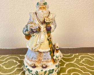 Christmas St. Nicholas Music Box. Ceramic St. Nicholas, a reminder of the history of Christmas. The figure features St. Nicholas with a swan, carrying a basket with flowers. A beautiful item to add to your collection of Christmas Decor.
Note photos for details and condition. Measurements taken under field conditions are approximate within 1/2". Feel free to reach out with any questions.
Items are heavy and we do not assist with loading. Be sure to bring adequate help and a large enough vehicle for large items. If you need assistance, call Denny for an estimate for delivery. (720) 393-0204.