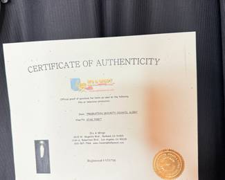 Official movie pop / costume
Certified "Federation Security Council Alien" Costume TV/Film Star Trek. Registered Number ST1718
Please see pictures. There is a hole/rip in the shoulder and glue/stapes showing. Sold as is.
COA included