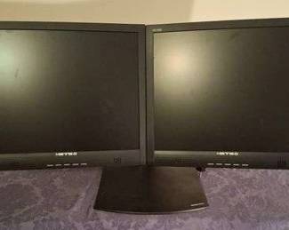Two monitors with heavy duty stand