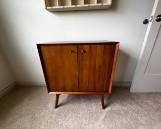 Front shot of solid wood midcentury side table/cabinet