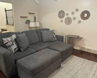 Sofa with ottoman - reversible chaise lounge cushion can be left or right sided.