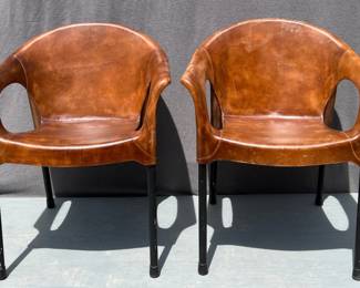 Pair of Modern leather wrapped armchairs by Cello Furniture
