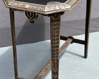 Art Deco heavy bronze side table with original reverse painted glass top
