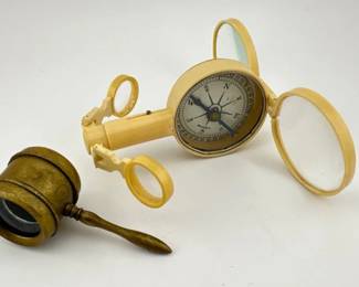 Coddington type magnifying glass, compass tool