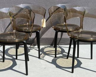 Set of four acrylic amber armchairs