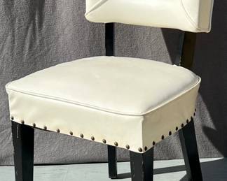 White vinyl 1950’s side chair with open back