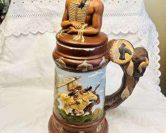 Signed Native American figural beer stein.