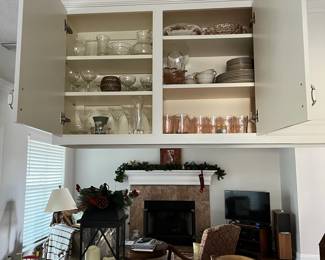 crystal, serving dishes and antique decorative items in cabinet for sale