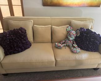 Paine-Dijon Lauren Sofa , Pair of Pier 1 Purple Ruffled Throw Pillows, Mickey Mouse Floral Plush