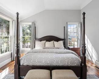 4 poster wood bed.