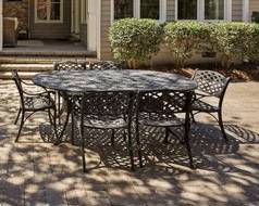 Outdoor wrought iron table and chairs. Excellent condition