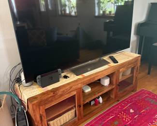 Nintendo Switch, Woven Colorful Rug, Sony TV