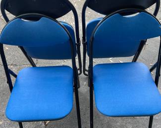 Four folding chairs