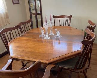 Dining room table with six chairs and three leaves