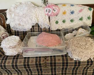 Hundreds of homemade doilies in all sizes