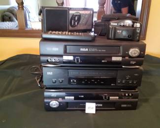 Three DVD Players, Radio And Canon Camera
